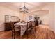Elegant dining room featuring a modern chandelier and hardwood floors; perfect for Gathering gatherings at , Las Vegas, NV 89131