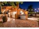 The home's exterior with a charming outdoor space featuring brick flooring and wooden accents for outdoor enjoyment at , Las Vegas, NV 89131