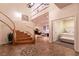 Spacious foyer with a winding staircase, decorative tile accents, and an open view of the living area at , Las Vegas, NV 89131