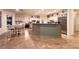 Open kitchen features a large island, modern appliances, and ample counter space at , Las Vegas, NV 89131