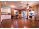 Inviting living area with wood-paneled walls, featuring a dining table and fireplace at , Las Vegas, NV 89131