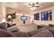 Relaxing living space featuring a sectional sofa, custom cabinetry, and soft lighting at , Las Vegas, NV 89131