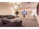 Spacious living area with a large sectional sofa, built-in entertainment center, and a welcoming feel at , Las Vegas, NV 89131