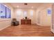 Bright living room with hardwood floors, recessed lighting, multiple windows and access to other rooms at , Las Vegas, NV 89131