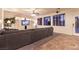 Inviting living room with built-in entertainment center, large windows, and a cozy atmosphere at , Las Vegas, NV 89131