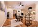 Upstairs loft area set up as an office space, with hardwood floors, stylish lighting and multiple windows at , Las Vegas, NV 89131