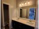 Bathroom features a double sink vanity and shower at 1027 Cambridge Park St, Las Vegas, NV 89148