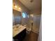 Modern bathroom with walk in shower and black vanity at 1027 Cambridge Park St, Las Vegas, NV 89148