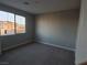 Bedroom with neutral walls, carpet and bright natural light at 1027 Cambridge Park St, Las Vegas, NV 89148