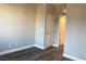 Bright bedroom with neutral colors, laminate flooring, white trim and a closet at 1027 Cambridge Park St, Las Vegas, NV 89148