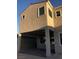 Exterior view showcasing a covered patio area and stucco finish at 1027 Cambridge Park St, Las Vegas, NV 89148