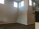 Bright, open living room with soaring ceilings and wood flooring at 1027 Cambridge Park St, Las Vegas, NV 89148