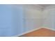 Empty walk-in closet with wire shelving and wood-look tile floors at 10513 Longwood Dr, Las Vegas, NV 89134