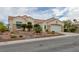 Attractive one-story home featuring low-maintenance landscaping and a two-car garage at 10513 Longwood Dr, Las Vegas, NV 89134