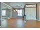 Spacious living room with tile floors, recessed lighting, and natural light at 10513 Longwood Dr, Las Vegas, NV 89134