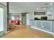 Open concept living space features modern kitchen, dining and living areas at 10513 Longwood Dr, Las Vegas, NV 89134