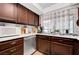 This traditional-style kitchen features stainless steel appliances and ample counter space at 1060 Neil Armstrong Cir, Las Vegas, NV 89145