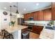 Well-equipped kitchen featuring stainless steel appliances, granite counters, and ample cabinet space at 10750 Red Badge Ave, Las Vegas, NV 89166