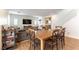 Spacious living area with open floor plan connecting living, dining, and staircase at 10750 Red Badge Ave, Las Vegas, NV 89166