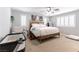 Bright main bedroom with a King bed, natural light, and a relaxing atmosphere at 10750 Red Badge Ave, Las Vegas, NV 89166