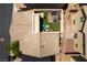 Aerial shot of a rooftop patio with outdoor seating, an artificial lawn, and a sleek design at 10750 Red Badge Ave, Las Vegas, NV 89166