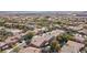 From above, see this tranquil neighborhood with tree-lined streets and well-maintained homes and pools at 11112 Pine Greens Ct, Las Vegas, NV 89144