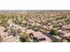 A birds-eye view of a residential neighborhood showcasing the well-maintained homes and landscaping at 11112 Pine Greens Ct, Las Vegas, NV 89144