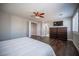 Bedroom featuring hardwood floors and an ensuite bathroom at 11112 Pine Greens Ct, Las Vegas, NV 89144