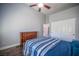 This spacious bedroom features a large dresser, and closet with plenty of room for storage at 11112 Pine Greens Ct, Las Vegas, NV 89144