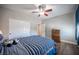 Bright bedroom with closet and hardwood floors provides ample space for storage and comfort at 11112 Pine Greens Ct, Las Vegas, NV 89144