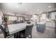 View of the kitchen, dining area, and open living space, showcasing a modern design at 11112 Pine Greens Ct, Las Vegas, NV 89144
