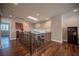 The view from the loft landing featuring hardwood floors and a skylight at 11112 Pine Greens Ct, Las Vegas, NV 89144