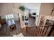 View from the top of the stairs overlooking the living room, dining room and office at 11112 Pine Greens Ct, Las Vegas, NV 89144