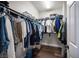 Walk-in closet featuring a storage system for clothes and shoes at 11112 Pine Greens Ct, Las Vegas, NV 89144