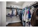 Spacious walk-in closet featuring custom shelving and ample storage for clothes and accessories at 11112 Pine Greens Ct, Las Vegas, NV 89144
