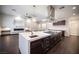 Gourmet kitchen boasts a large island, stainless steel appliances, and modern finishes at 11119 River Hills Ln, Las Vegas, NV 89135