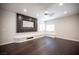 Spacious living room features a sleek built-in entertainment center and recessed lighting at 11119 River Hills Ln, Las Vegas, NV 89135