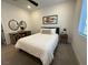 Inviting bedroom with a comfortable bed, stylish decor, and ample natural light at 12155 Sage Thunder Ave, Las Vegas, NV 89138