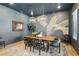 Spacious dining room with stylish lighting, unique wall art, and seating for six at 12155 Sage Thunder Ave, Las Vegas, NV 89138