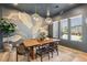Stylish dining room with modern light fixtures and neutral decor for elegant dining experiences at 12155 Sage Thunder Ave, Las Vegas, NV 89138