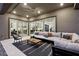 Inviting outdoor living space features modern decor, plush seating, and seamless indoor-outdoor flow at 12155 Sage Thunder Ave, Las Vegas, NV 89138