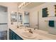Bright bathroom with double sinks, modern fixtures, and a large mirror enhancing the space at 1538 Pony Ranch Cir, Henderson, NV 89014