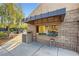 A community center offers tennis equipment for sale with outdoor seating on a sunny day at 1538 Pony Ranch Cir, Henderson, NV 89014