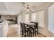 Breakfast dining area features modern table set, tiled flooring, and easy access to the living room at 1538 Pony Ranch Cir, Henderson, NV 89014