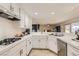 Functional kitchen showcasing ample counter space, gas range, and stainless steel appliances at 1538 Pony Ranch Cir, Henderson, NV 89014