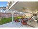 Covered patio with outdoor furniture, perfect for entertaining or relaxing at 1538 Pony Ranch Cir, Henderson, NV 89014