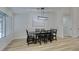Bright dining room features sleek modern light fixture and neutral paint at 1673 Golden Vista Dr, Las Vegas, NV 89123