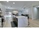 Open concept kitchen with an island and stainless steel appliances at 1673 Golden Vista Dr, Las Vegas, NV 89123