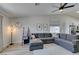 Inviting living room features a comfortable gray sectional and modern decor at 1673 Golden Vista Dr, Las Vegas, NV 89123