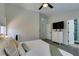 Comfortable main bedroom with soft carpet, a television, and an ensuite bathroom at 1673 Golden Vista Dr, Las Vegas, NV 89123